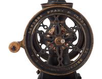 A Landers, Frary & Clark Painted Cast Iron Coffee Mill