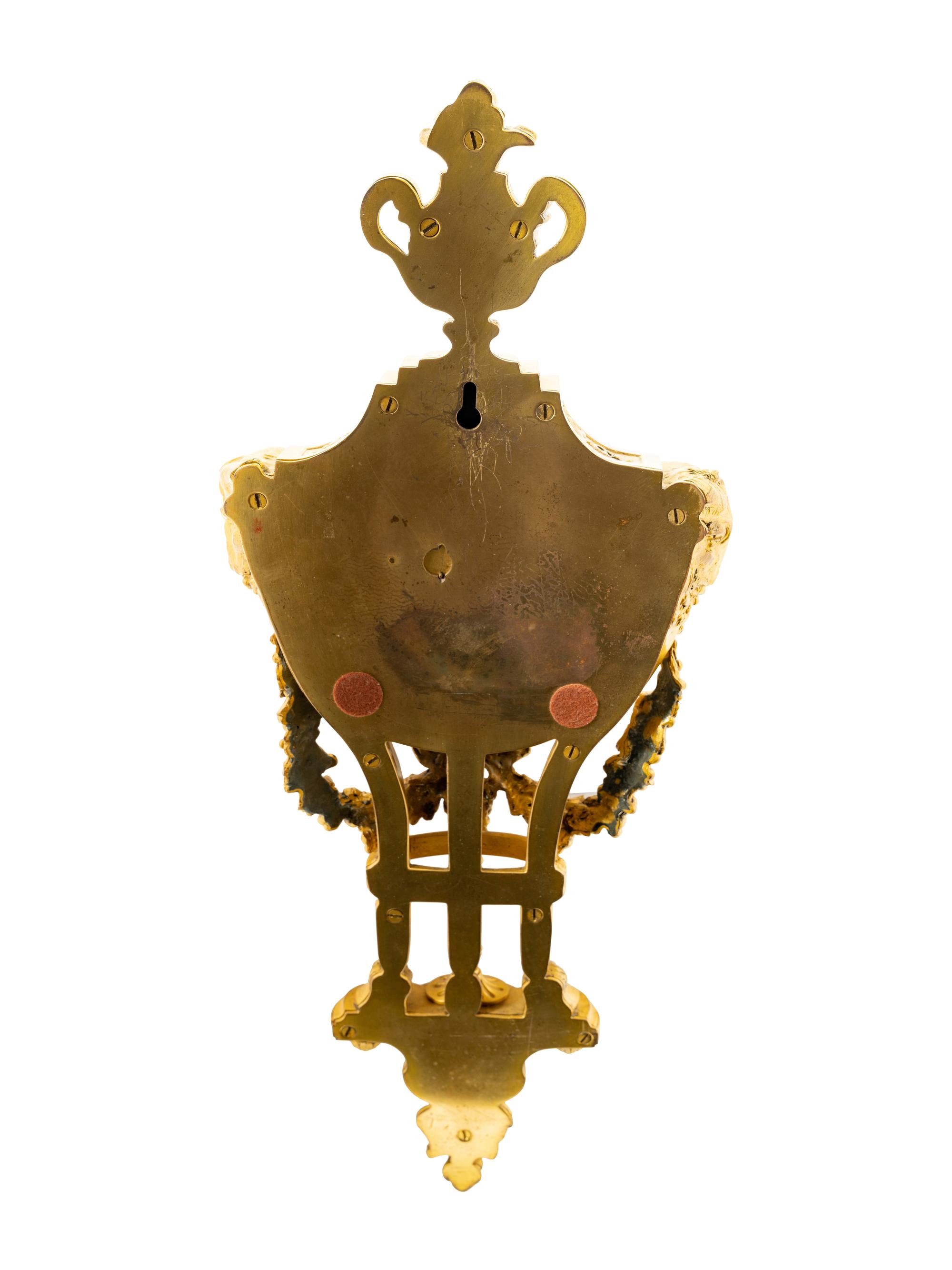 A Louis XVI Style Gilt Bronze Cartel Clock by E.F. Caldwell & Co.