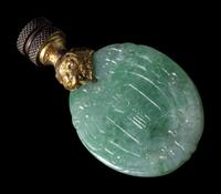 A Chinese Apple Green Jadeite Pendant