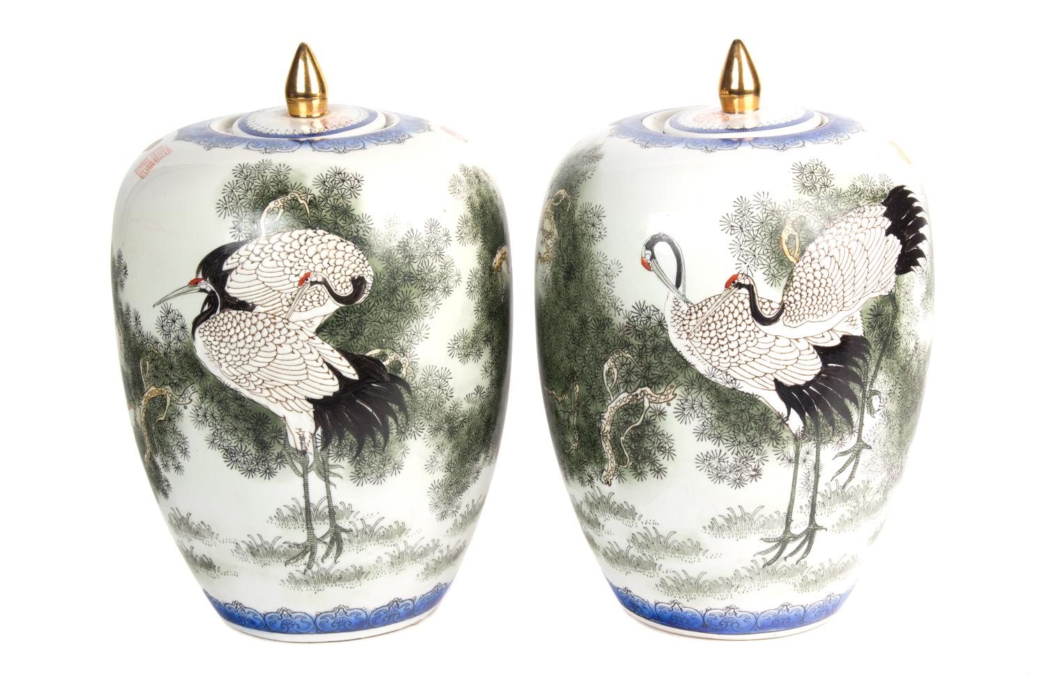 A Pair of Japanese Porcelain Ovoid Form Covered Vases Height 12 inches. — 20TH CENTURY