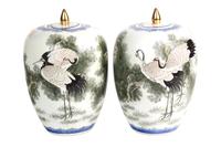 A Pair of Japanese Porcelain Ovoid Form Covered Vases Height 12 inches. — 20TH CENTURY