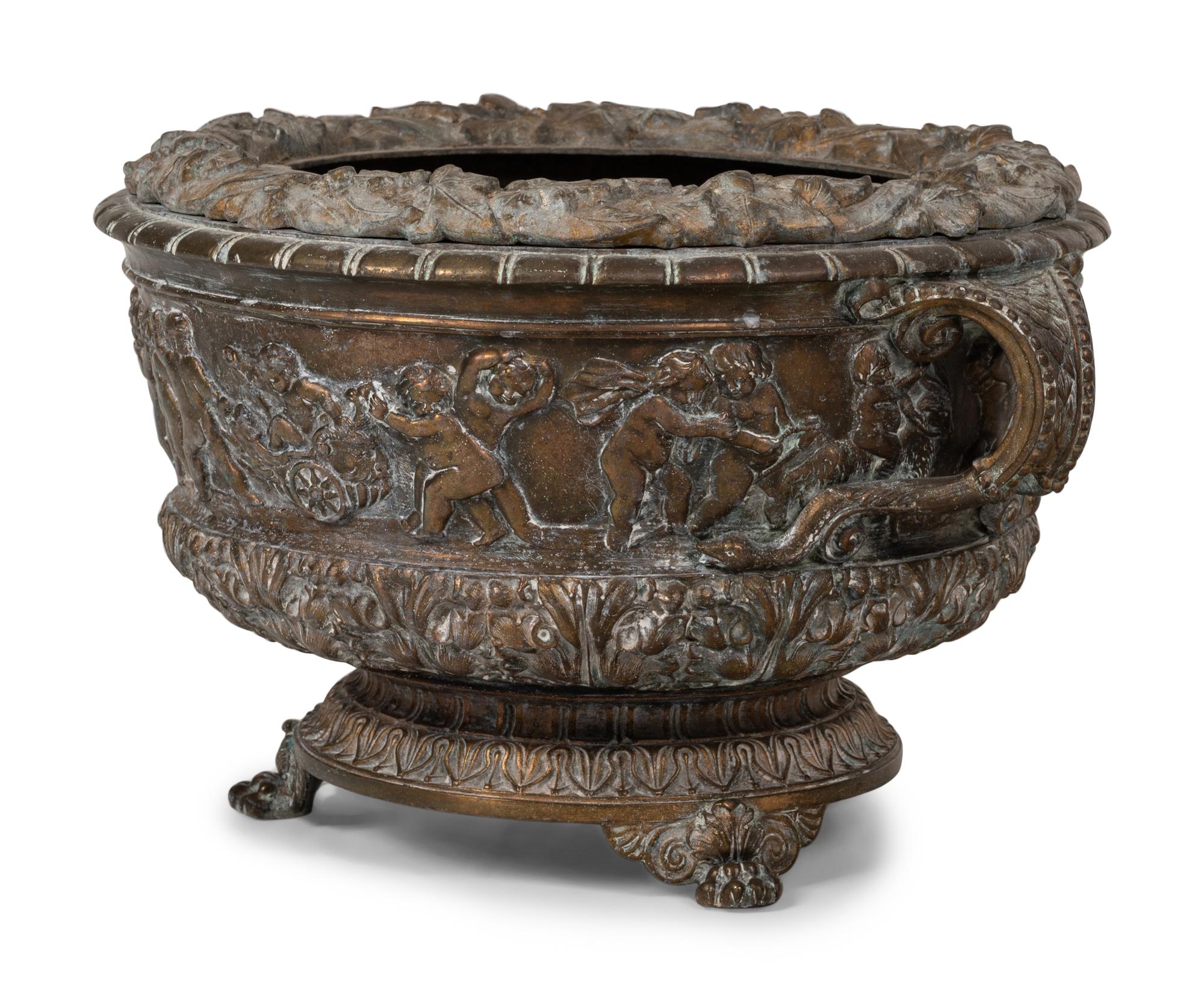 A Brass Two-Handled Jardinière with Bacchic Figures