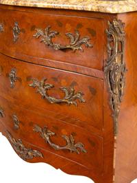 A Louis XV Style Gilt Bronze Mounted Marquetry Marble-Top Commode