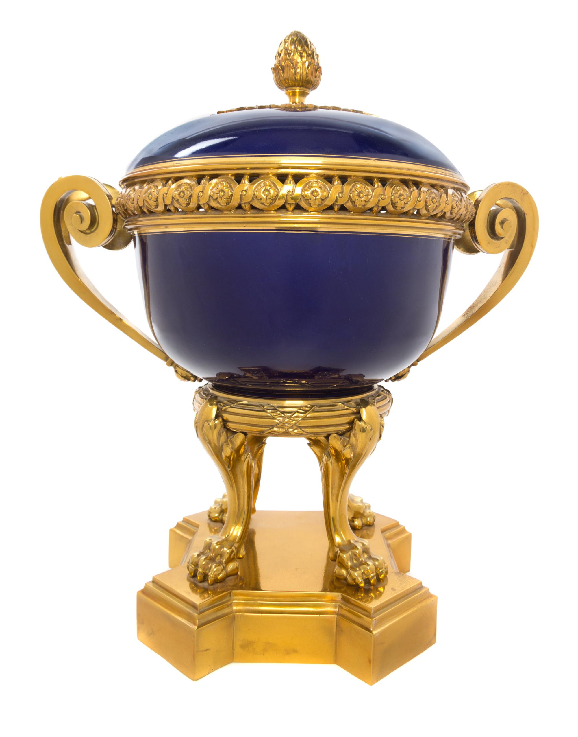 A Sevres Gilt Bronze Mounted Porcelain Cache Pot Width over handles 17 1/4 inches. — 19TH CENTURY