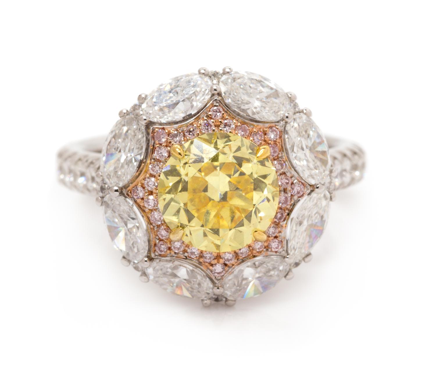 An 18 Karat Tricolor Gold, Fancy Vivid Yellow Diamond, Diamond and Colored Diamond Ring, 4.90 dwts.