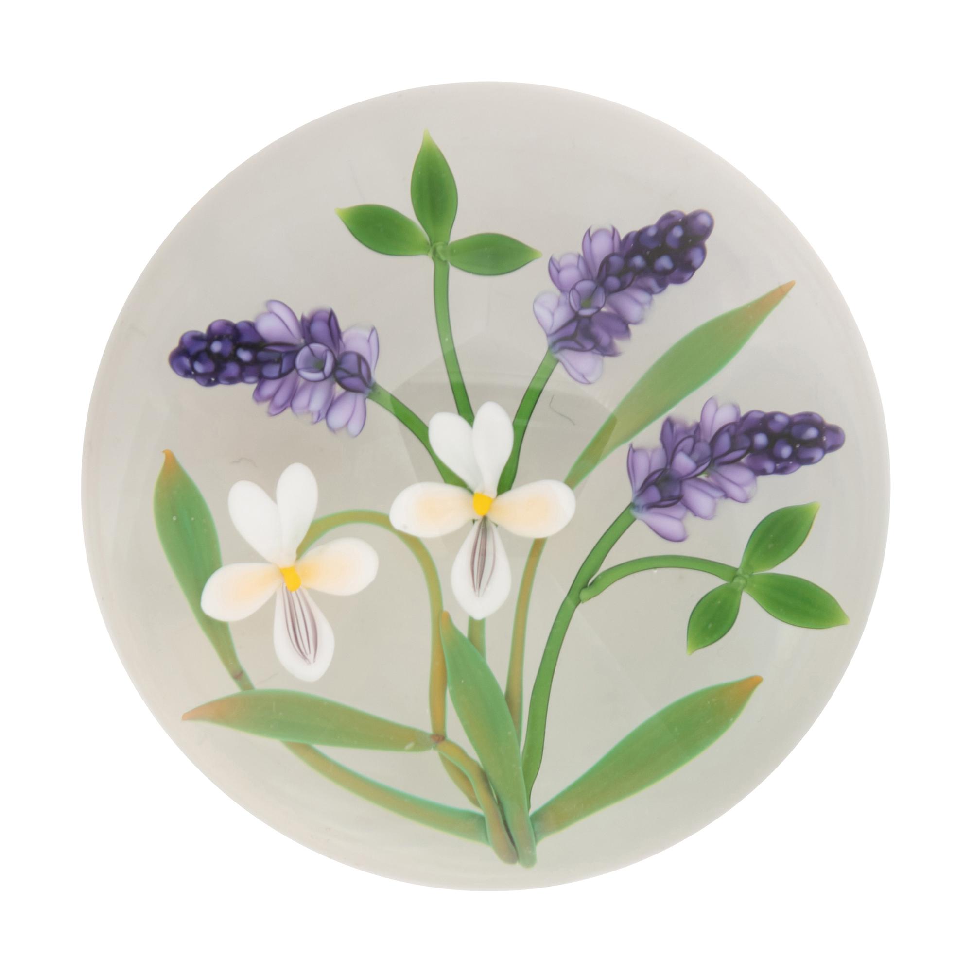 A Chris Buzzini Three Lavender Spears and Two White Flowers Glass Paperweight