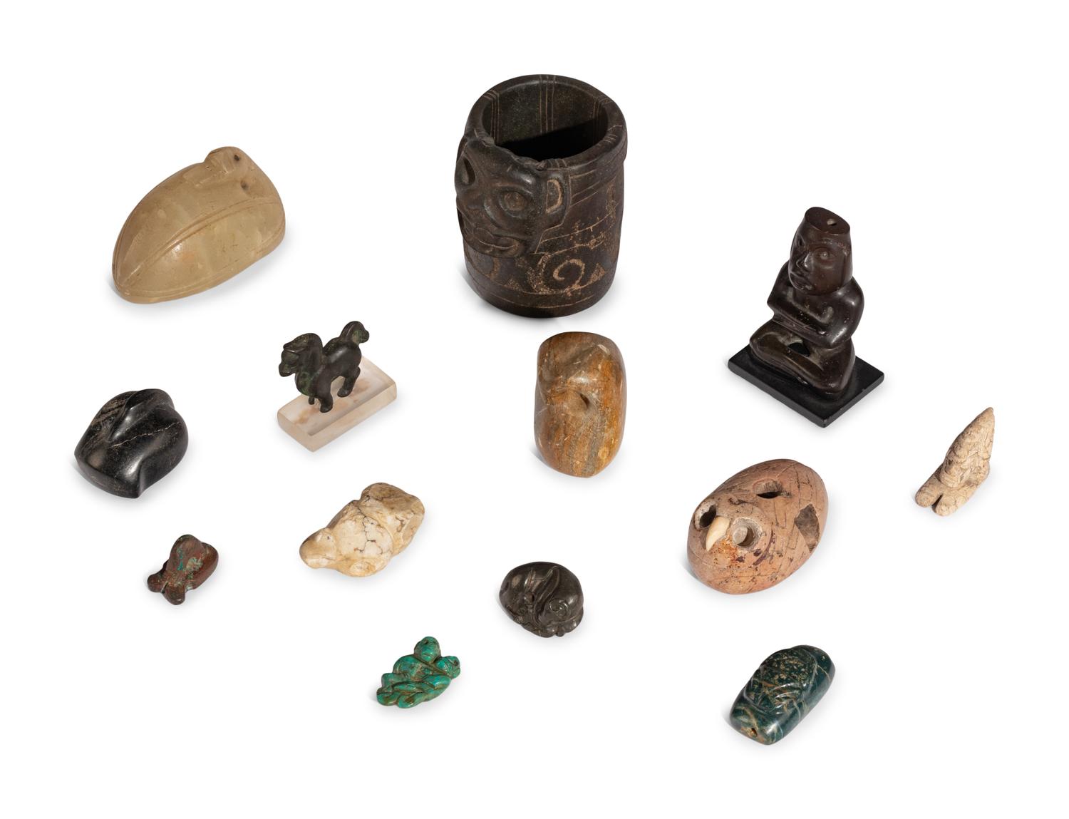 A Group of Twelve Pre-Colombian Style and Near Eastern Style Carved Stone Articles