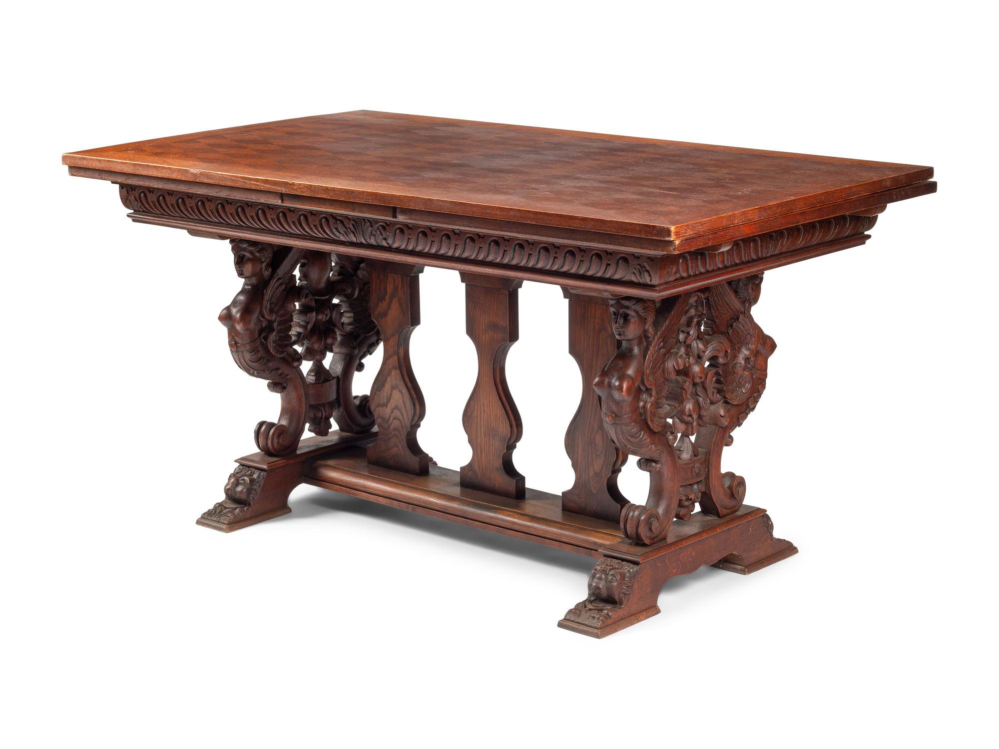 An Italian Renaissance Revival Draw-Leaf Dining Table