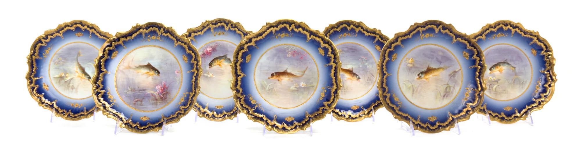 A Limoges Porcelain Partial Fish Service, Bawo & Dotter, Diameter 9 inches.