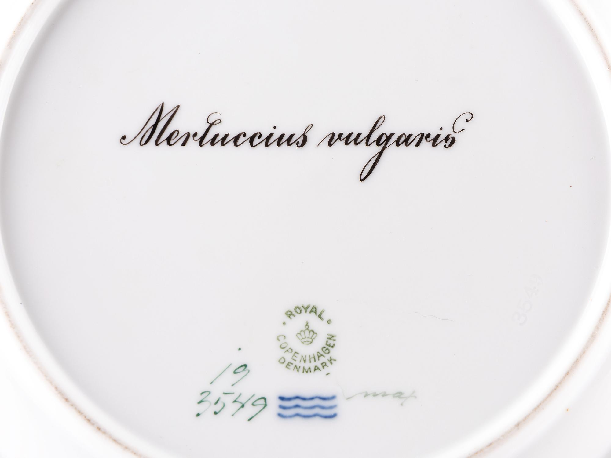 A Set of Twelve Royal Copenhagen Parcel Gilt Porcelain Fish Plates