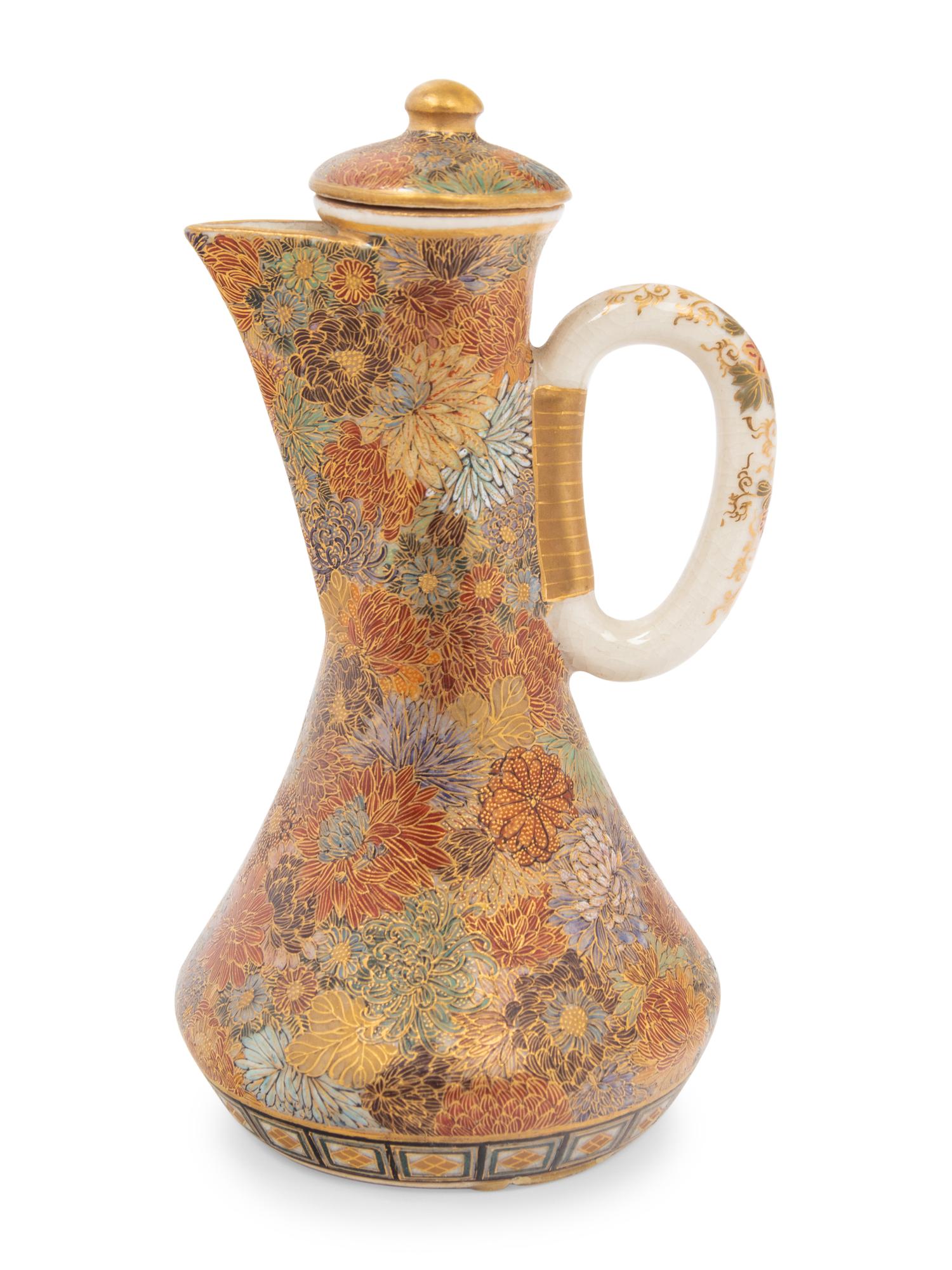 A Small Japanese Satsuma 'Millefleur' Covered Ewer