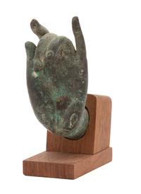 A Thai Bronze Hand of the Buddha Height 4 inches. — 19TH/20TH CENTURY