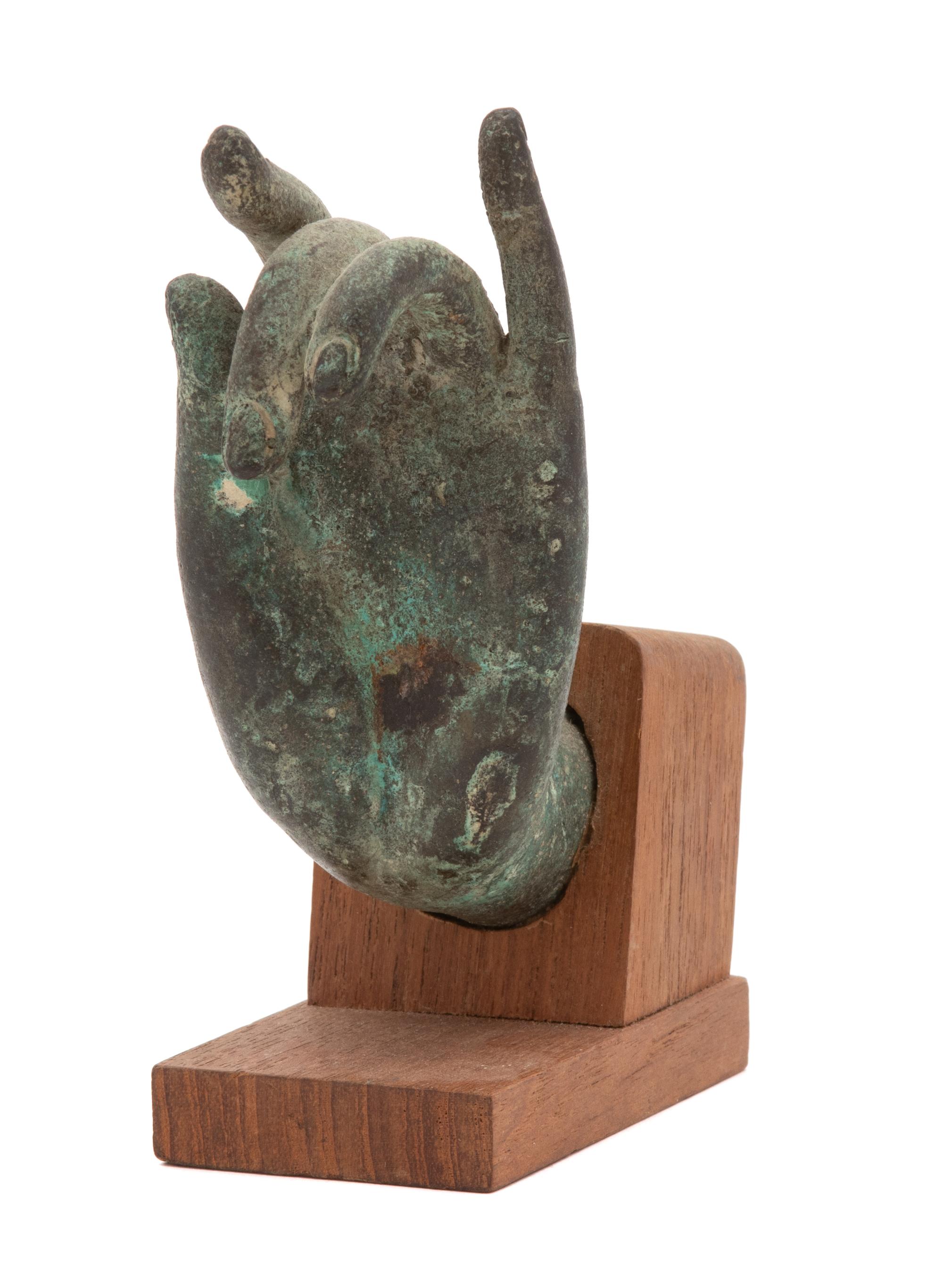 A Thai Bronze Hand of the Buddha Height 4 inches. — 19TH/20TH CENTURY