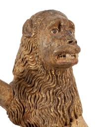 A Spanish Carved Wood and Polychrome Decorated Rampant Lion