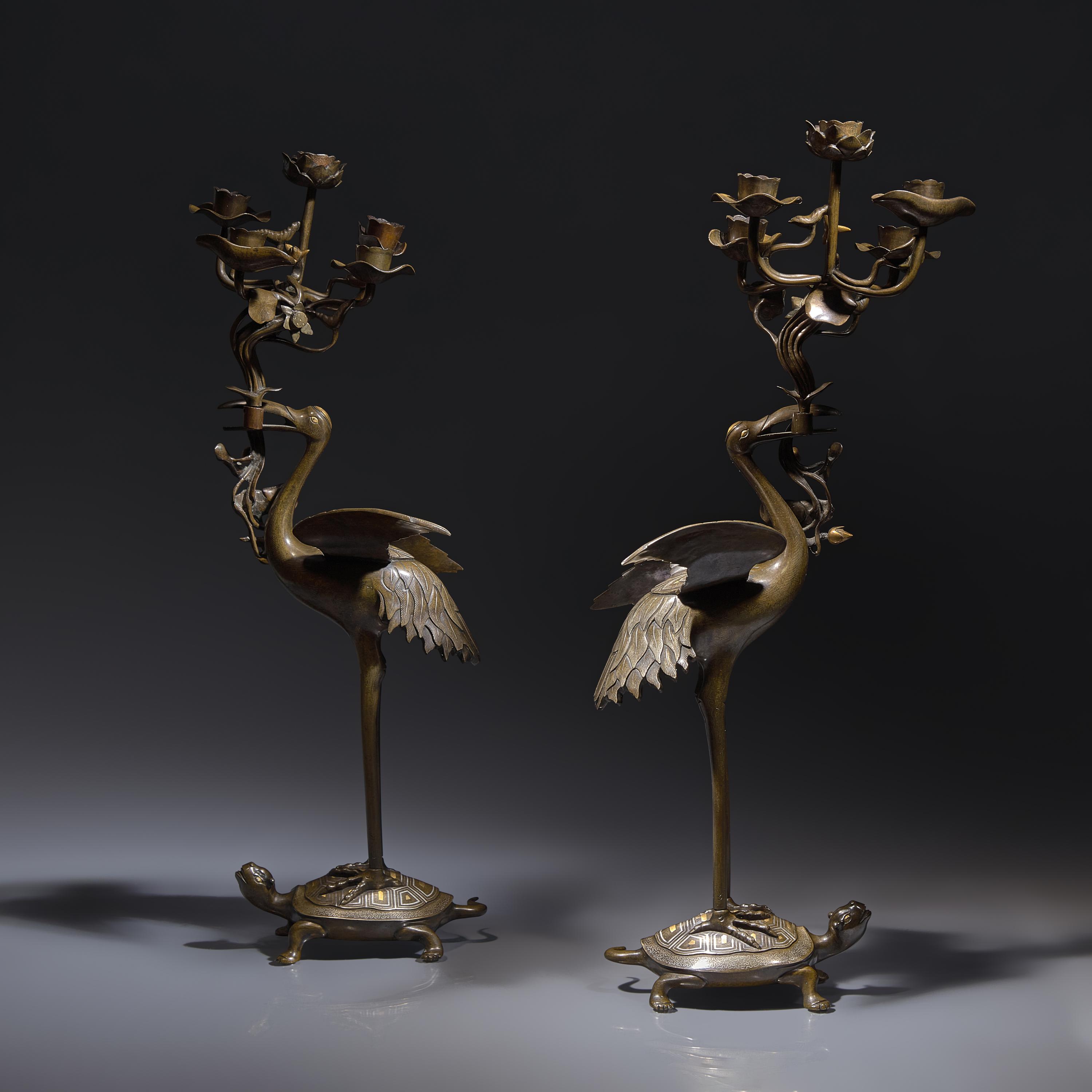 A Pair of Japanese Kaga Style Inlaid Bronze 'Crane and Minogame' Candelabra, Meiji Period — 日本明治時期 銅龜鶴齊齡燭臺一對