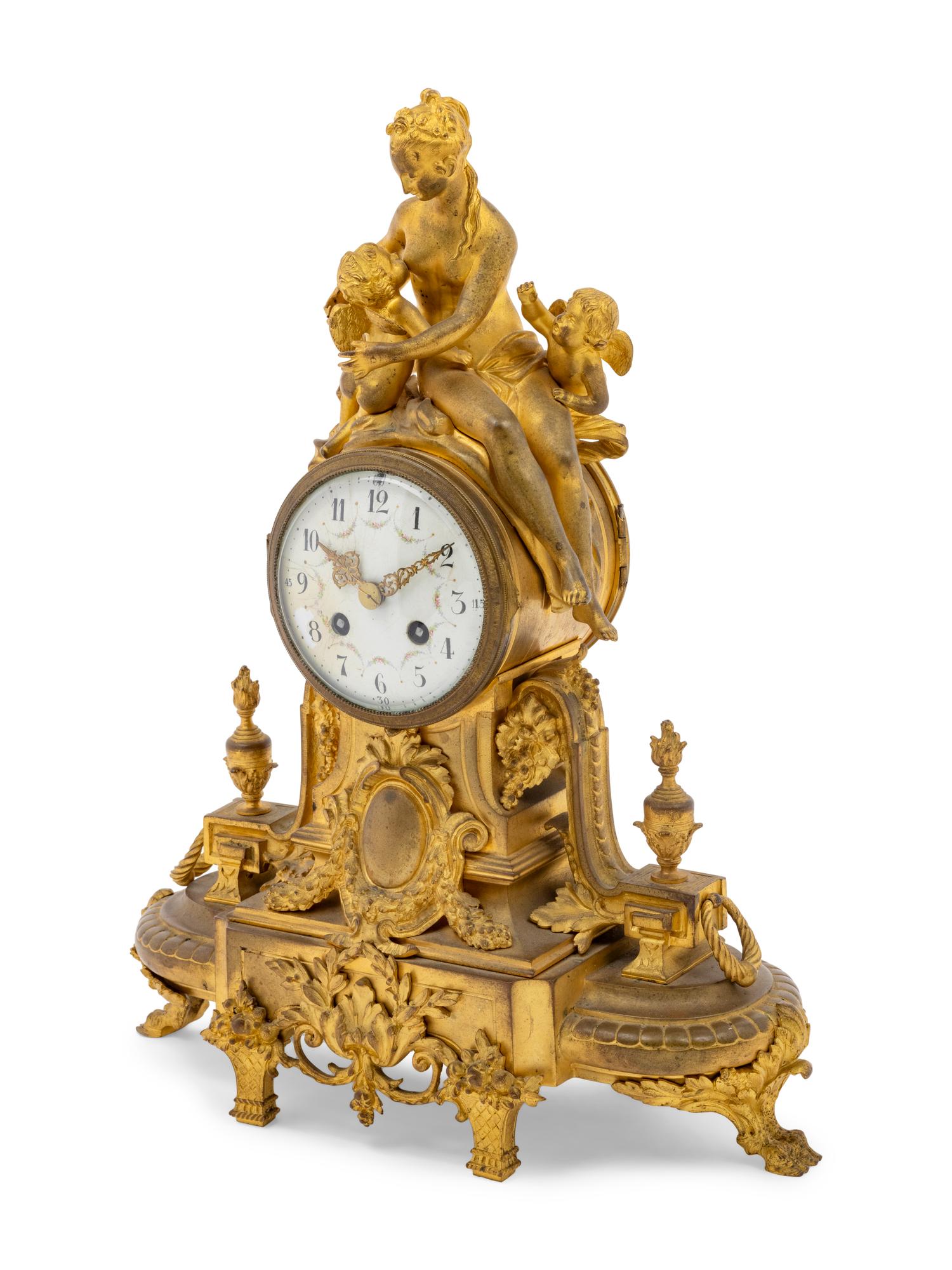 A French Gilt Bronze Figural Mantel Clock