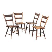 A Set of Four Hitchcock Black Painted and Stencil-Decorated Plank Bottom Side Chairs