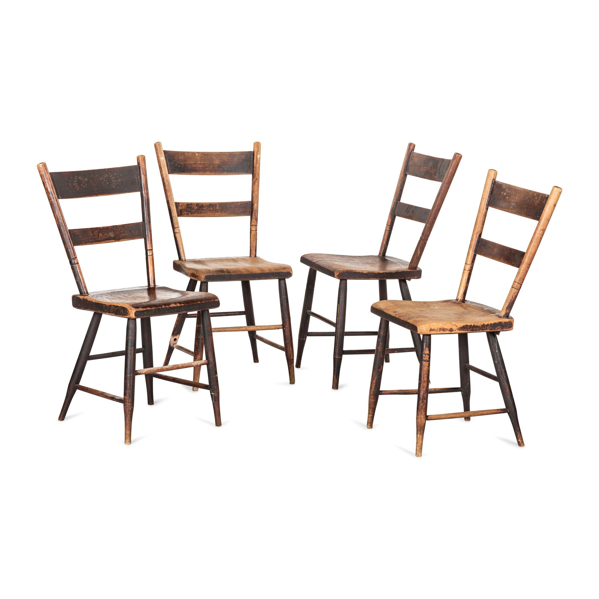 A Set of Four Hitchcock Black Painted and Stencil-Decorated Plank Bottom Side Chairs