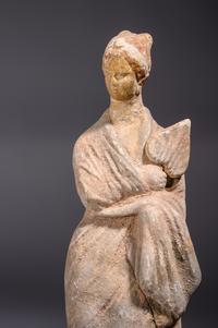 A Greek Terracotta Female with a Fan