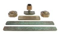 Tiffany Studios, EARLY 20TH CENTURY, a Zodiac pattern seven-piece desk set