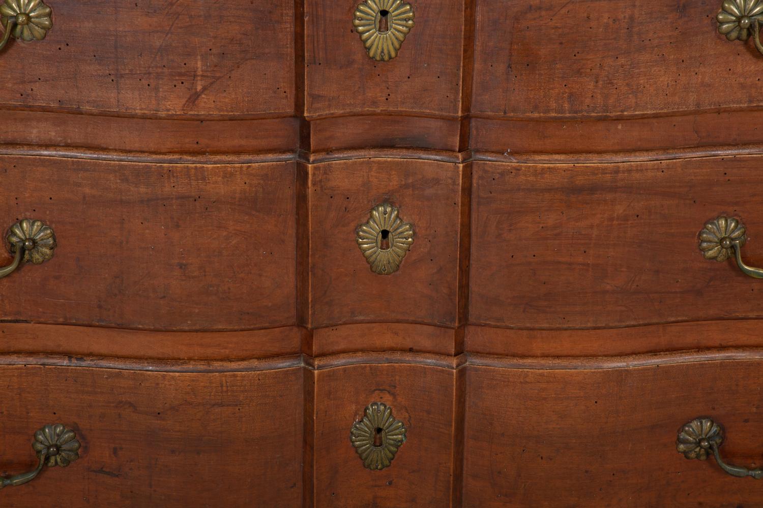 A French Provincial Carved Walnut Commode