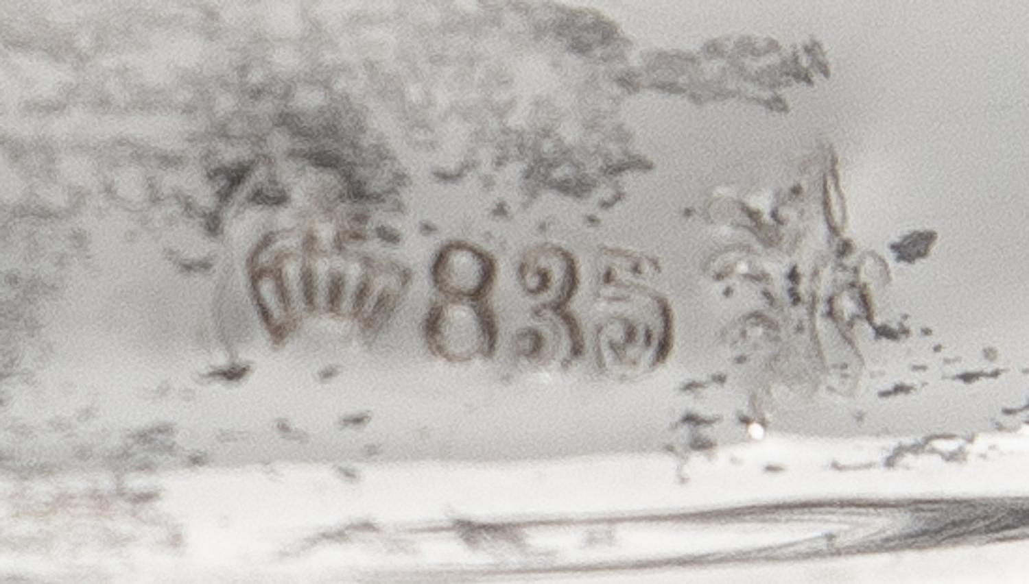 A Pair of German Silver Three-Light Candelabra, Gebruder Deyhle, Schwabisch Gmund, 20th Century, each stem issuing two scrolling candle