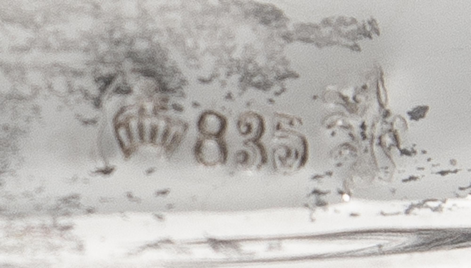 A Pair of German Silver Three-Light Candelabra, Gebruder Deyhle, Schwabisch Gmund, 20th Century, each stem issuing two scrolling candle