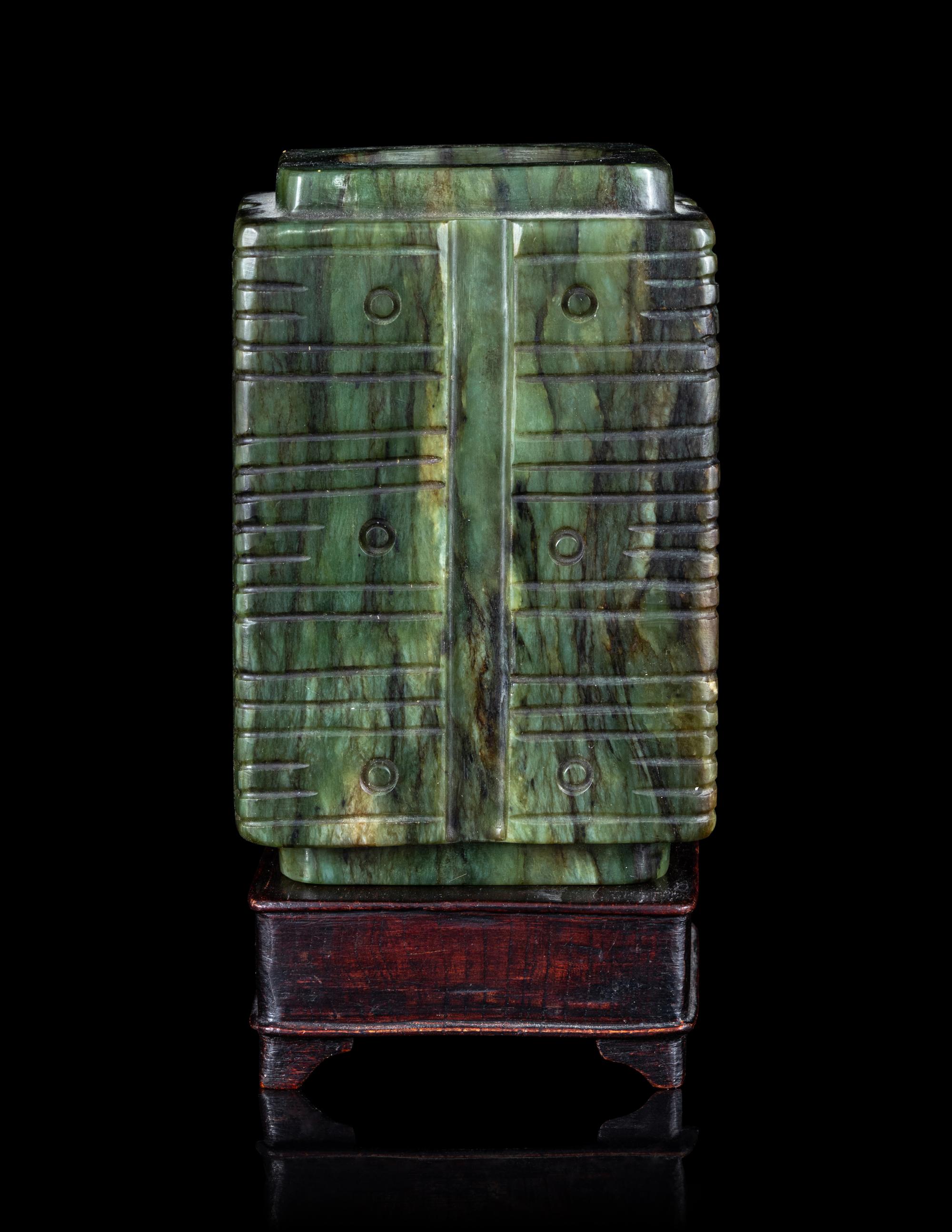 A Chinese Carved Green Jade Cong