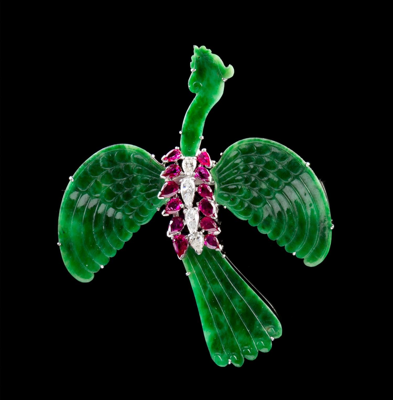 A Jadeite, White Gold, Diamond and Ruby Brooch Height 2 1/4 inches.