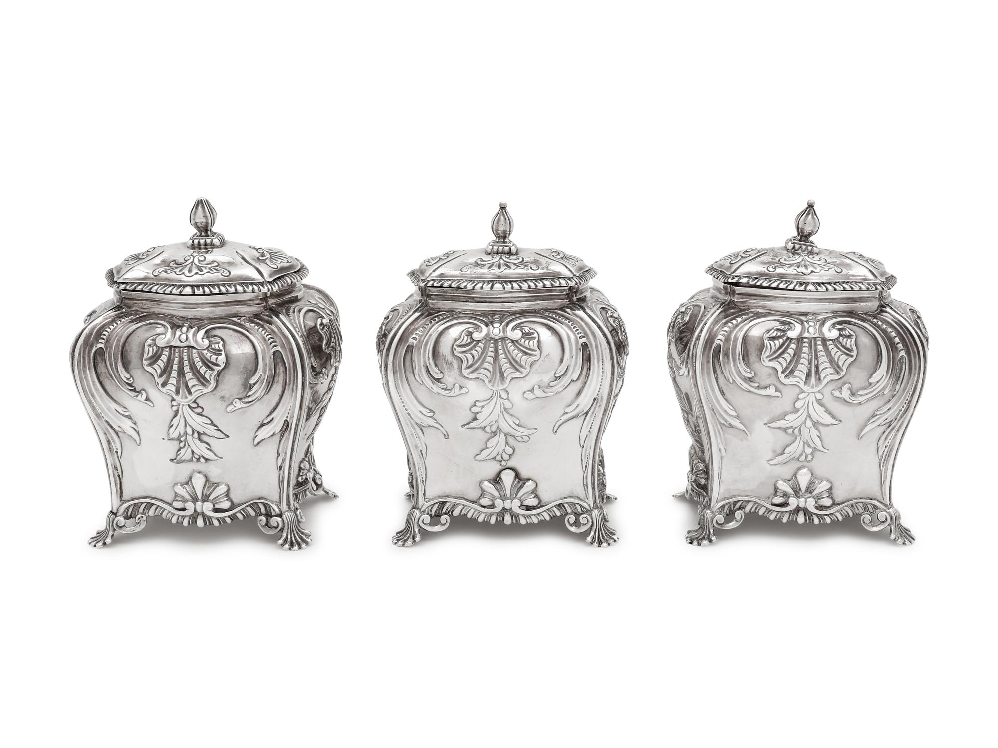 Three George III Silver Tea Caddies in a Leather-Cased Box