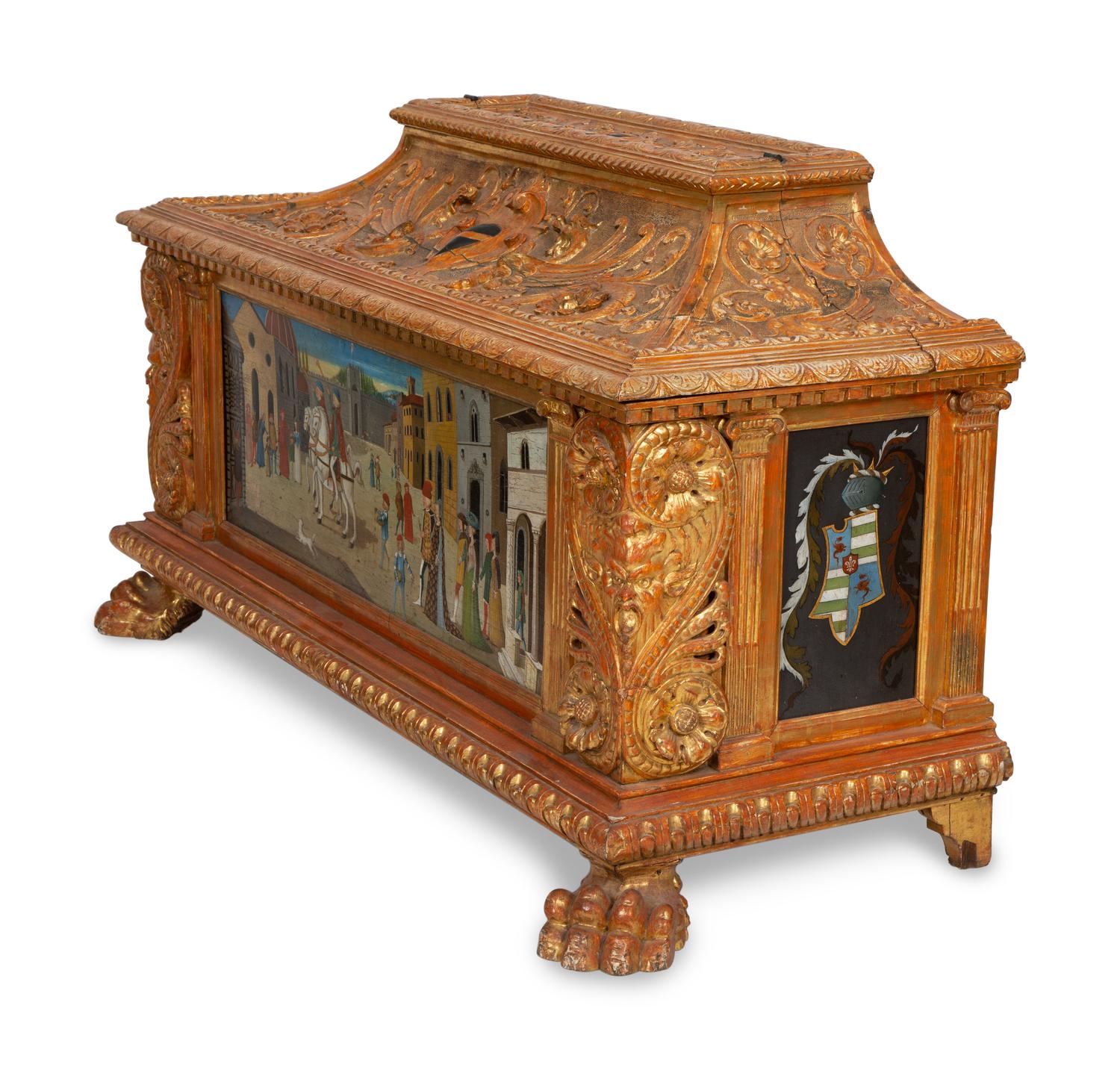 An Italian Renaissance Style Carved, Painted and Parcel Gilt Cassone