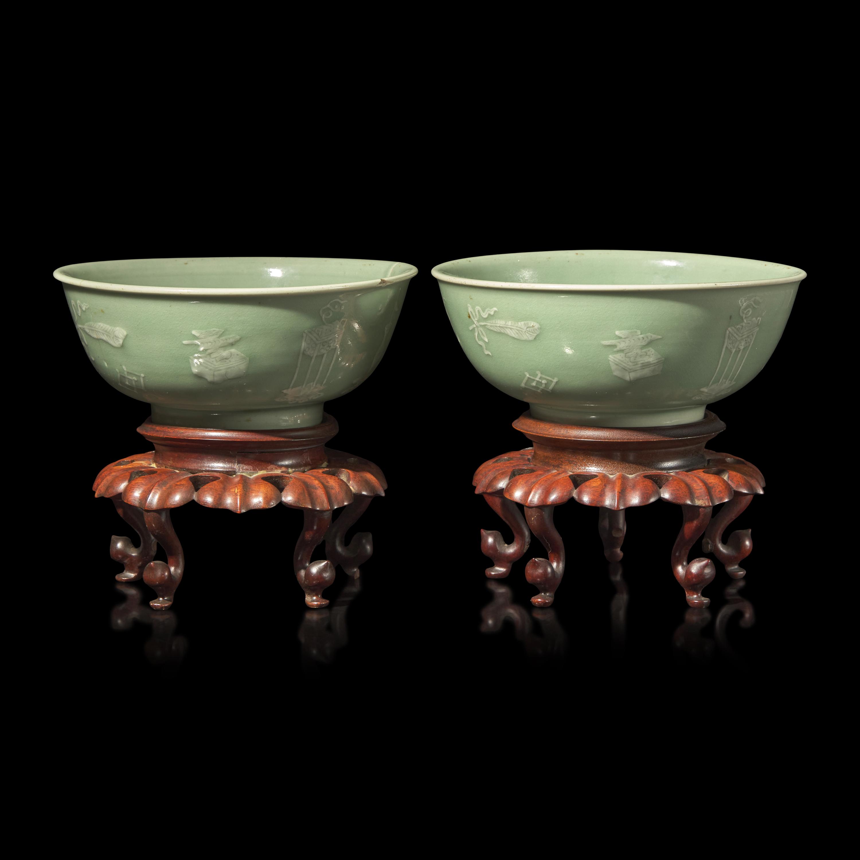 A Pair of Chinese Incised White Slip Decorated Celadon Ground Porcelain 'Bogu' Bowls, 18th/19th Century — 清中期 豆青地堆白博古图碗一对