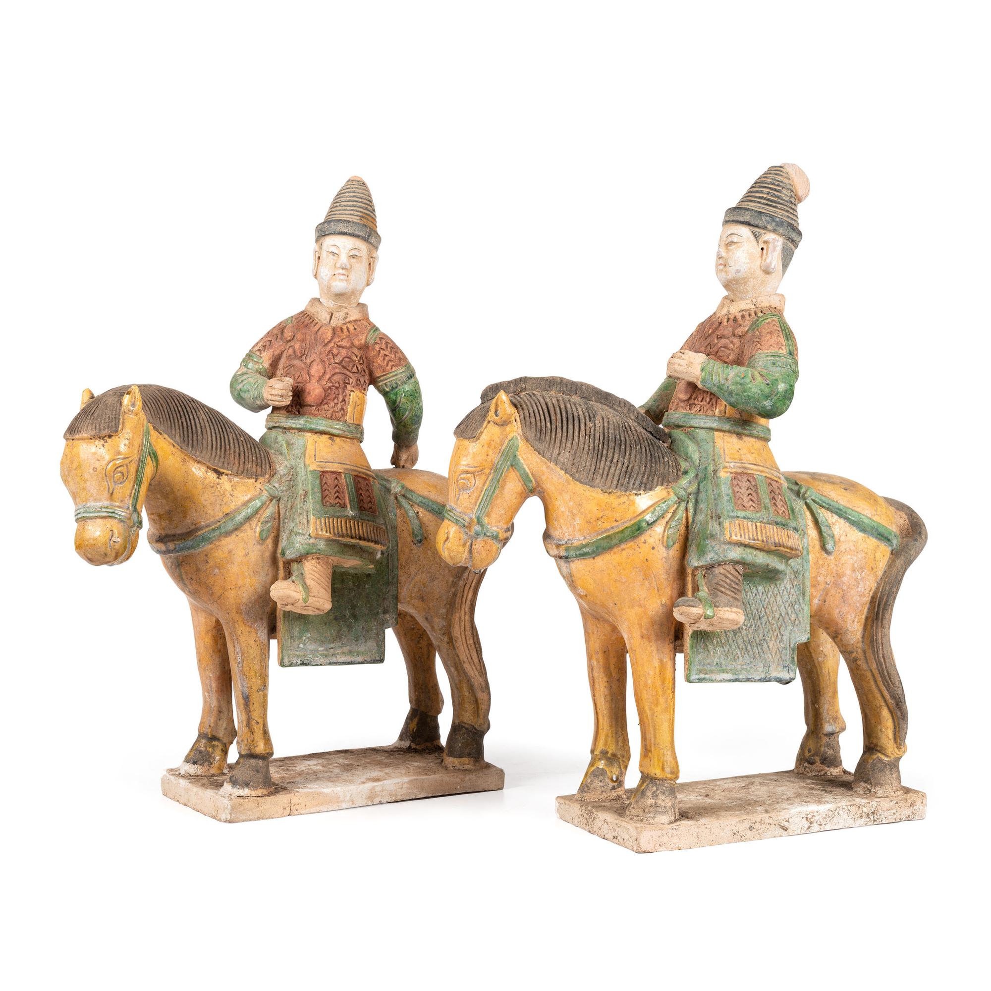 A Pair of Chinese Terracotta Equestrian Figures