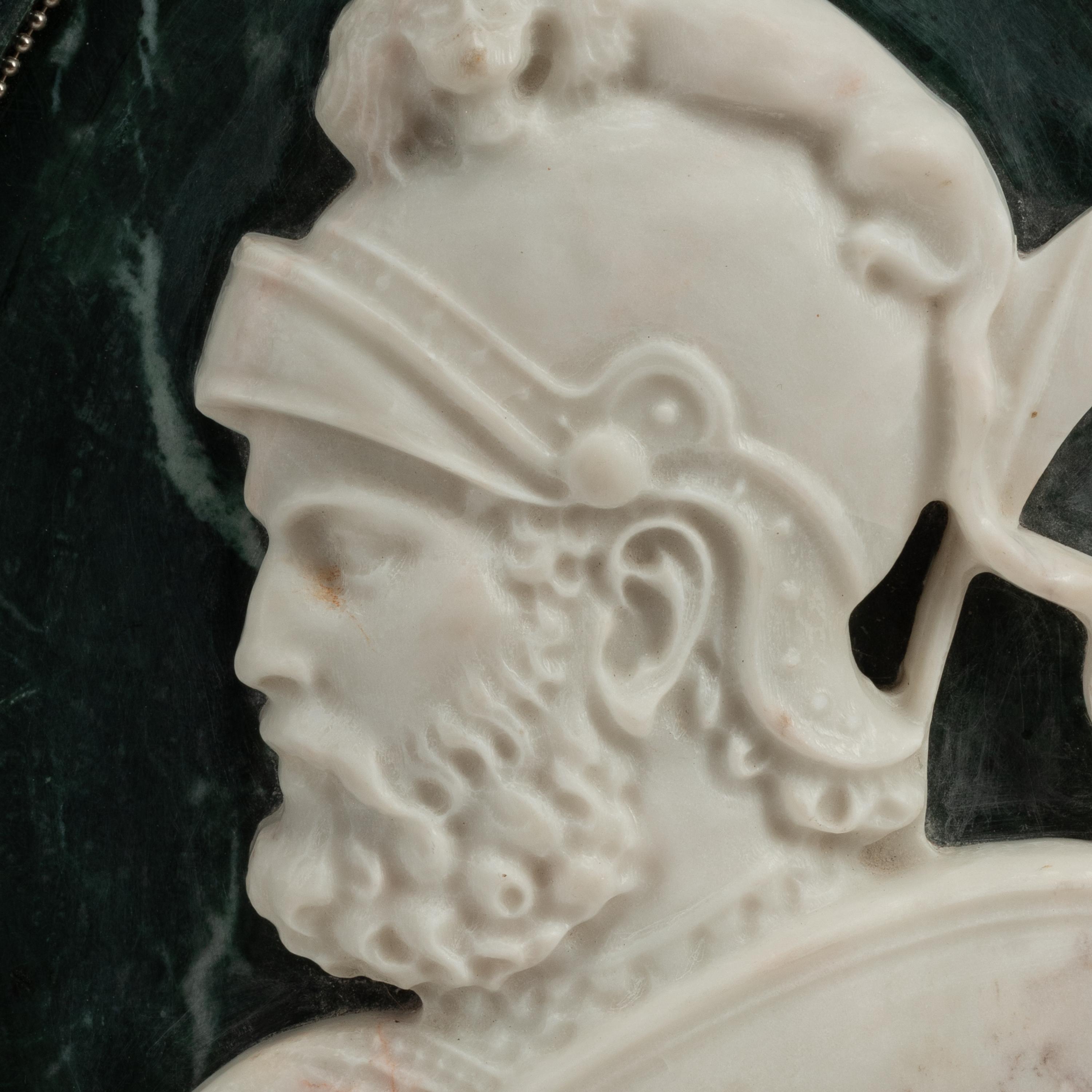 A Set of Four Italian Marble Oval Plaques