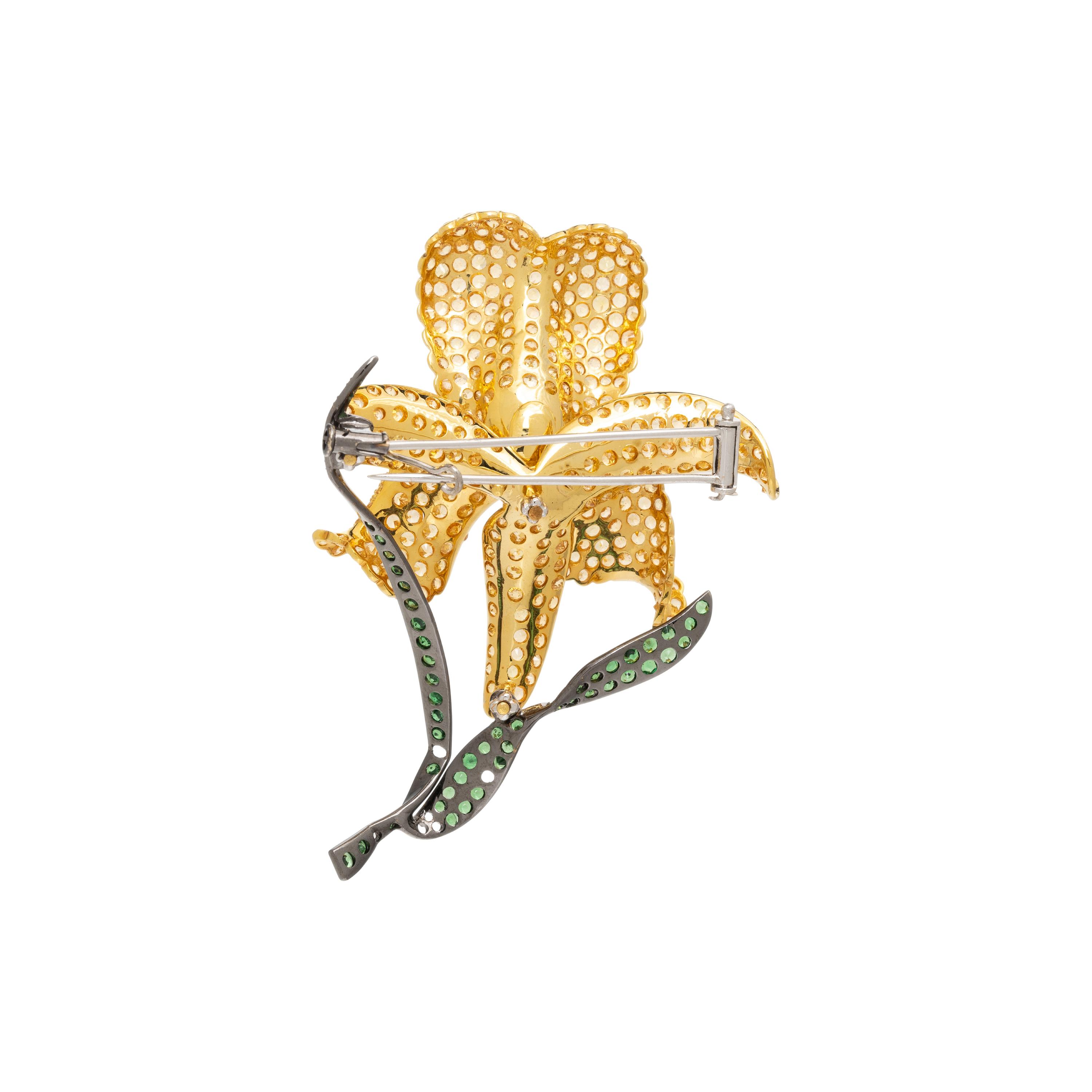 YELLOW SAPPHIRE, DIAMOND, AND TSAVORITE GARNET FLOWER BROOCH