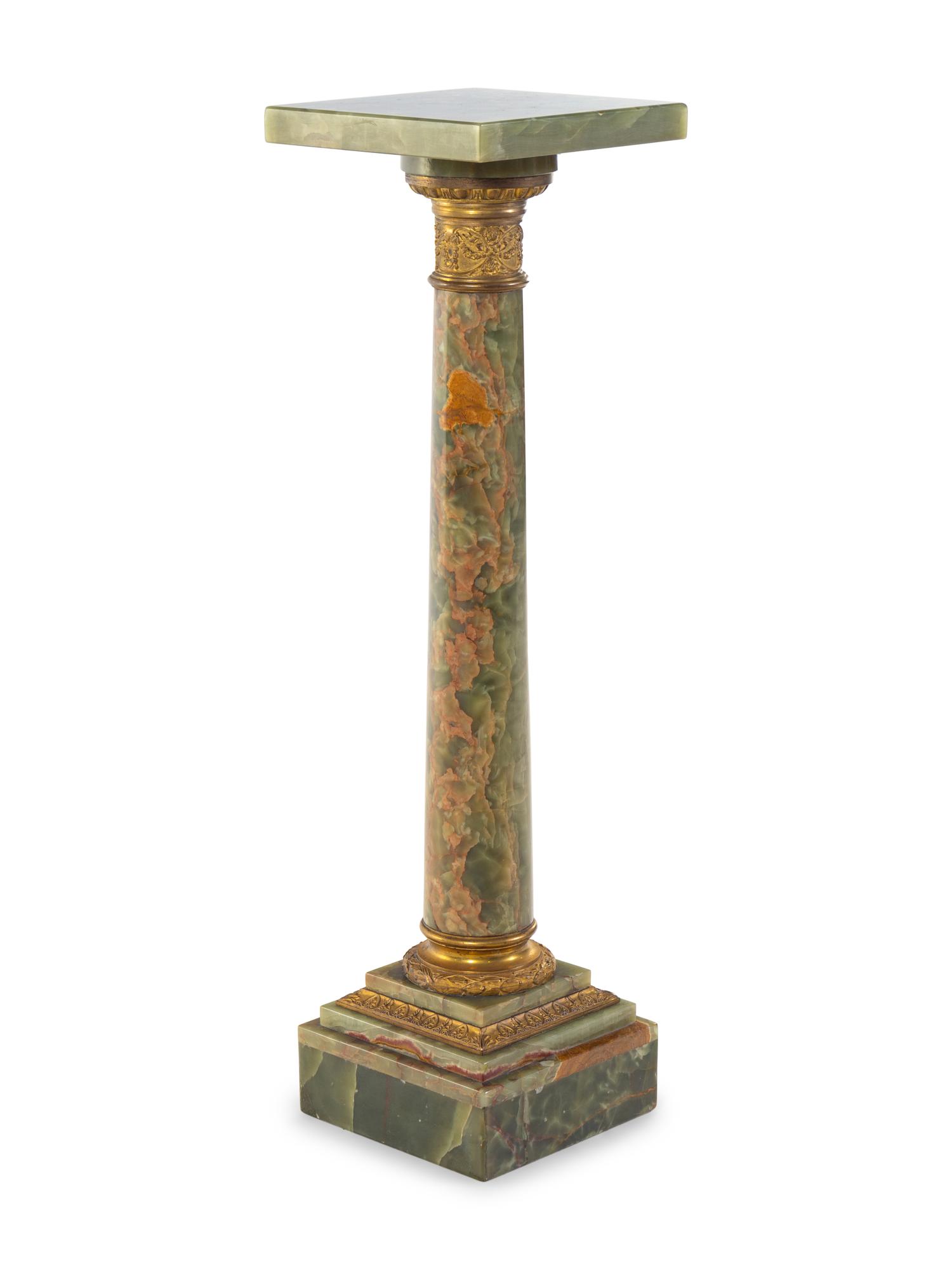 A Neoclassical Gilt Metal Mounted Onyx Pedestal