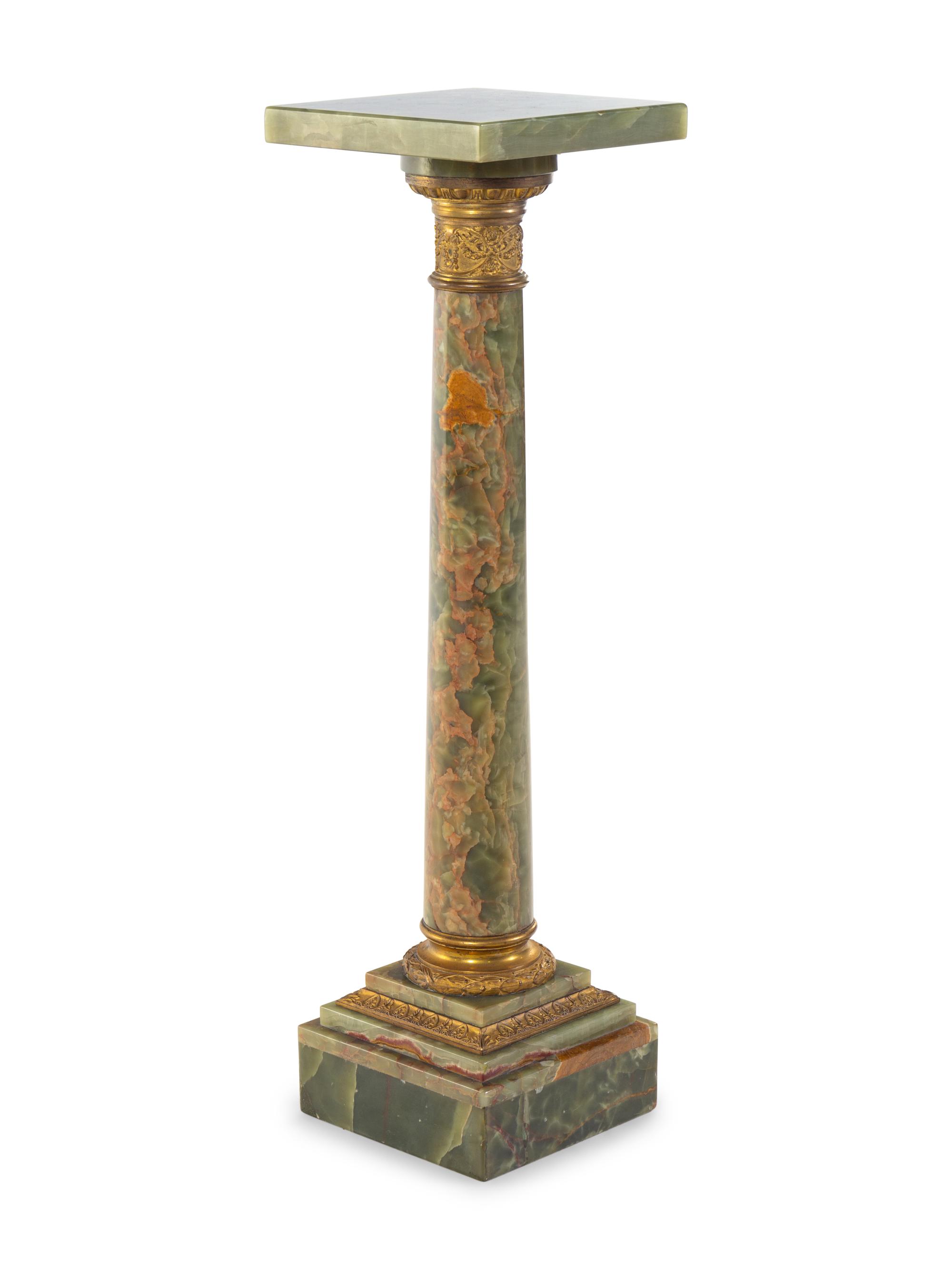 A Neoclassical Gilt Metal Mounted Onyx Pedestal