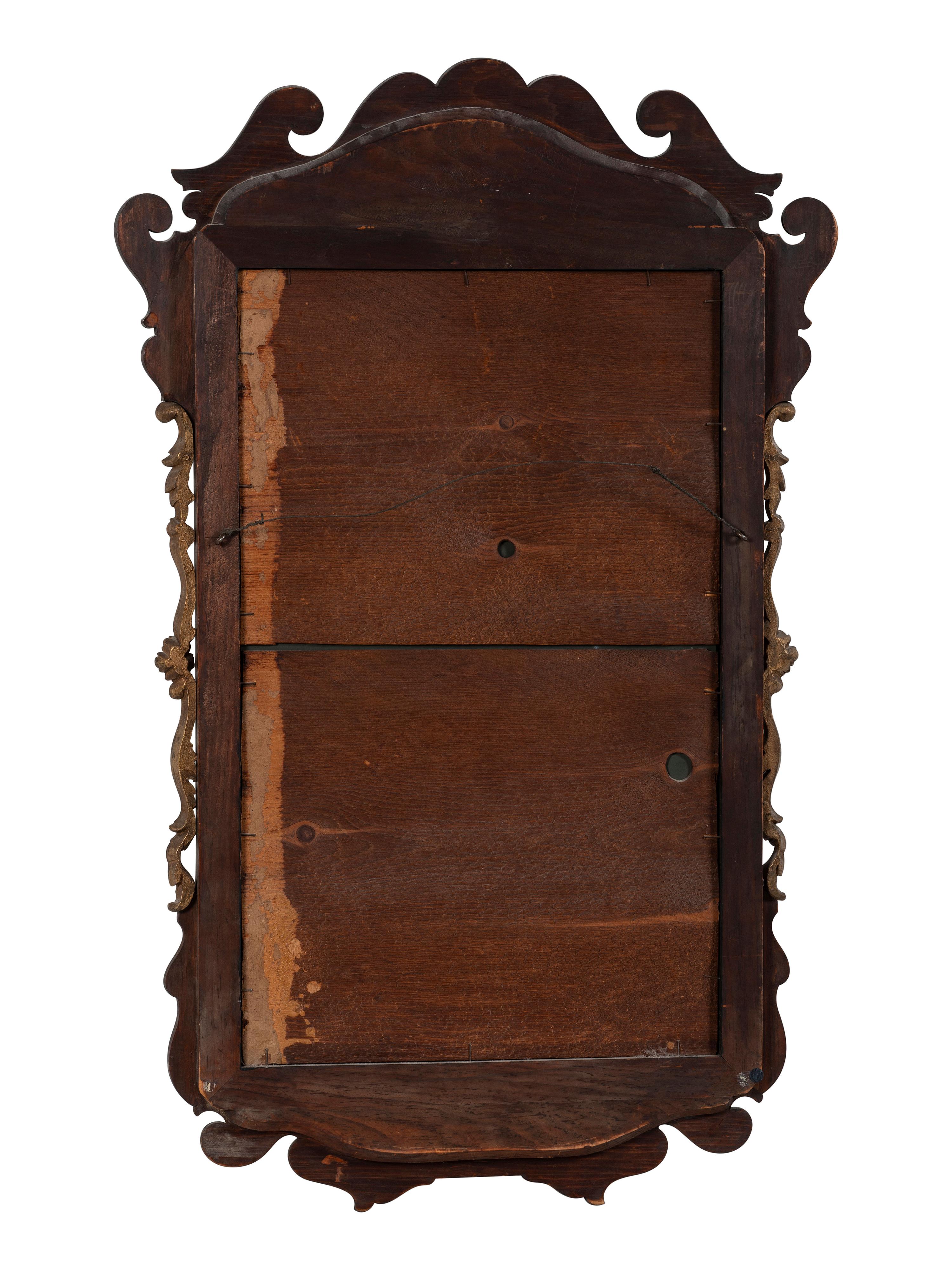 A George II Style Parcel Gilt Mahogany Mirror