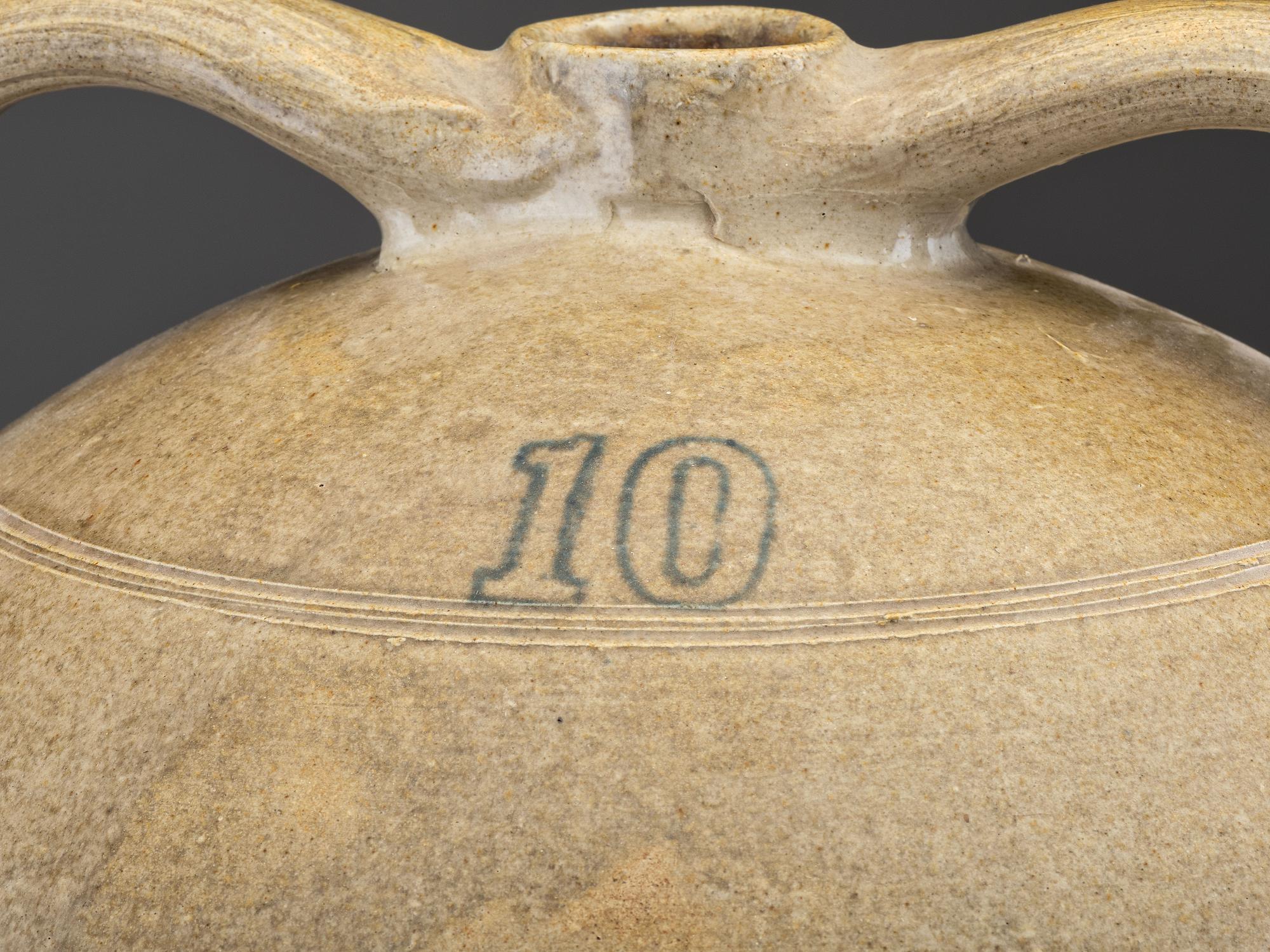 A Ten-Gallon Twin-Handled Stoneware Cooler