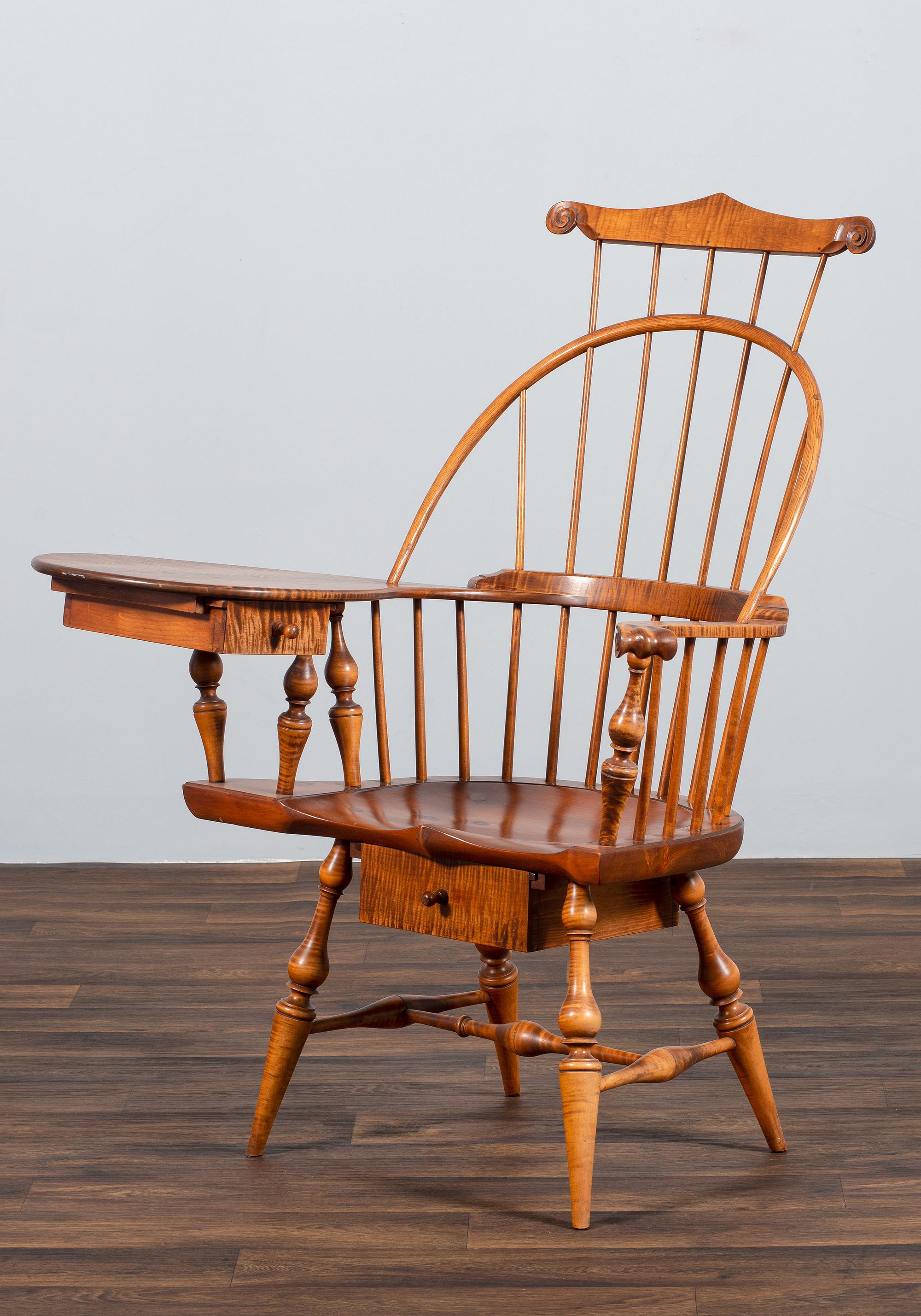 A D.R. Dimes Turned and Volute Carved Tiger Maple Windsor Three-Back Writing Armchair