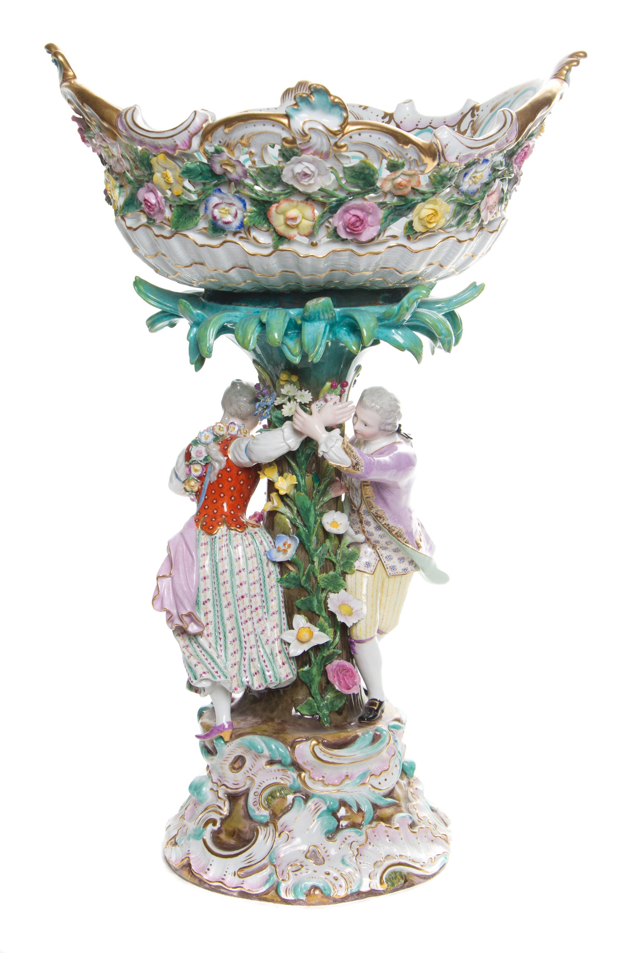 A Meissen Porcelain Figural Centerpiece Height 18 3/4 inches.