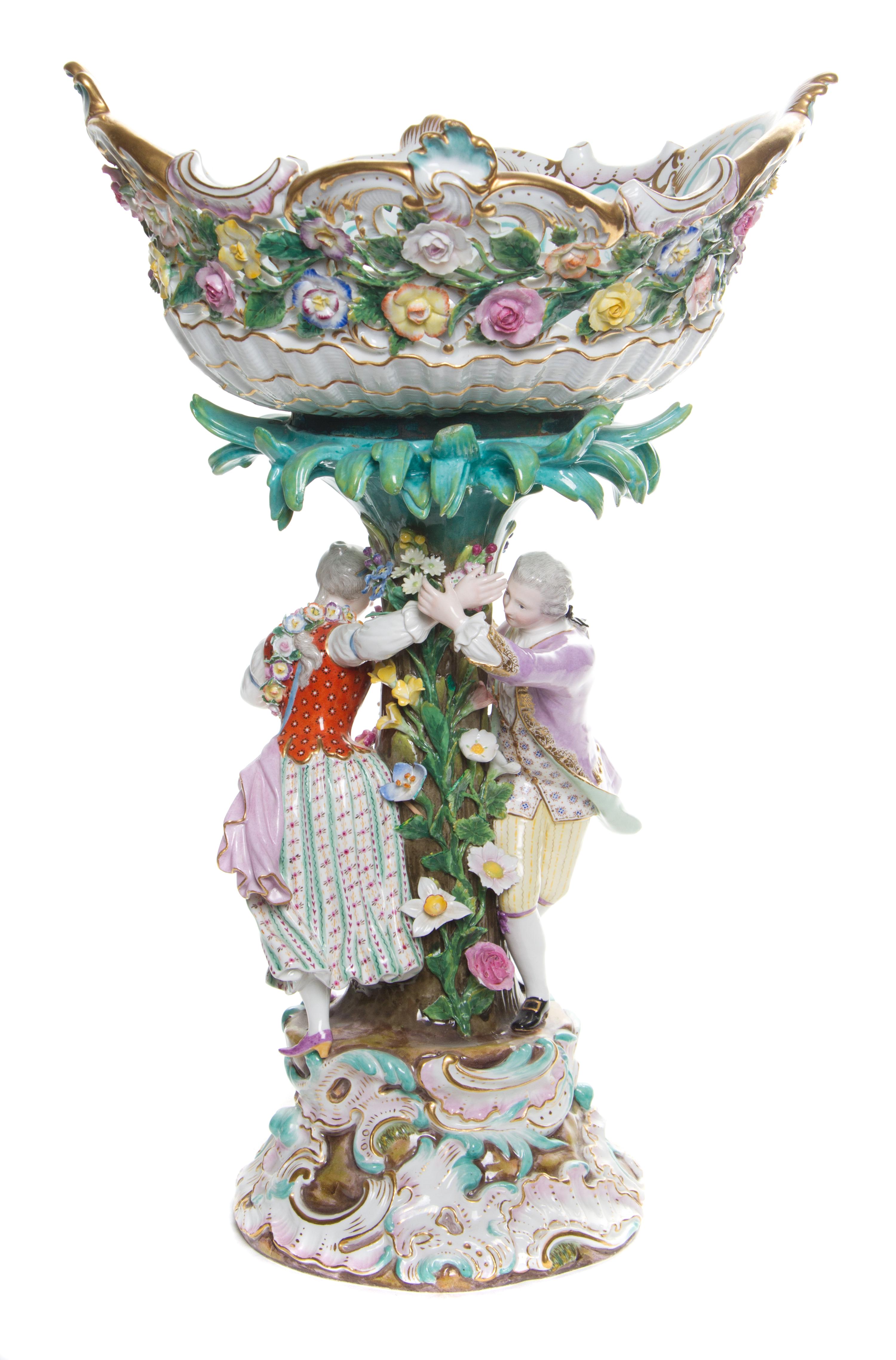 A Meissen Porcelain Figural Centerpiece Height 18 3/4 inches.