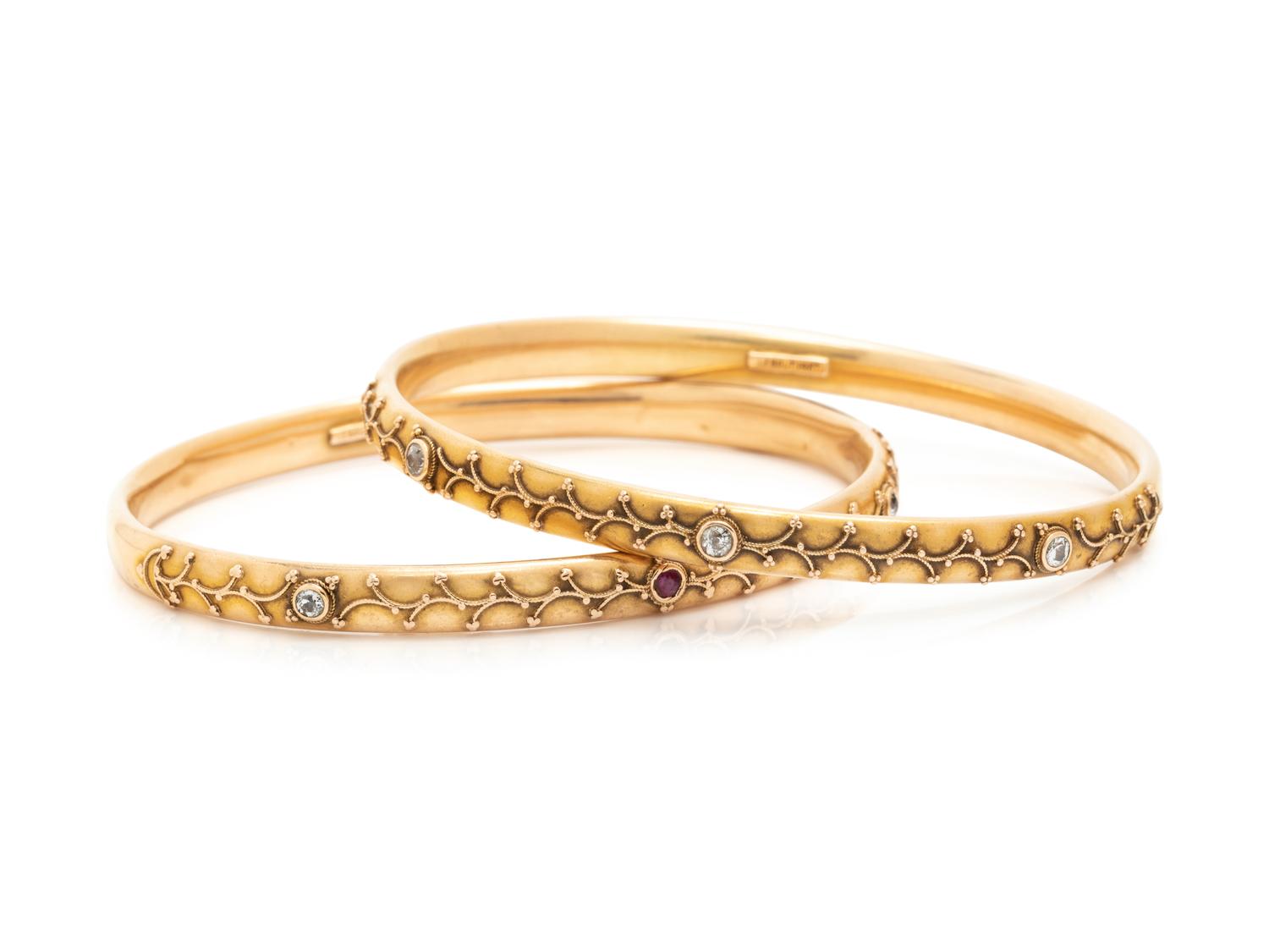 PAIR OF YELLOW GOLD AND DIAMOND BANGLE BRACELETS