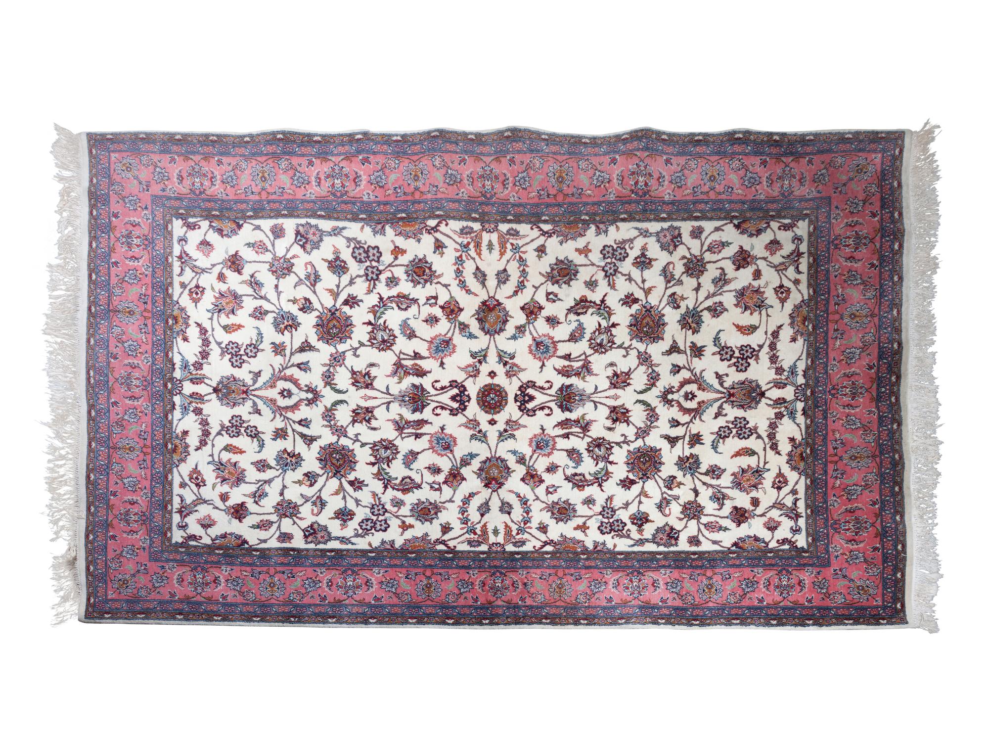 A Silk and Wool Rug — 20TH CENTURY