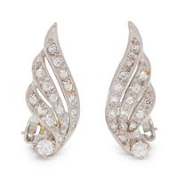 A Pair of White Gold and Diamond Earclips,