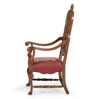 A Renaissance Revival Carved Hall Chair in Walnut with Shell-Form Crest and Pierced Back Splat