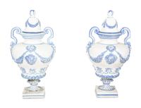 A Pair of Italian Blue and White Glazed Ceramic Covered Urns