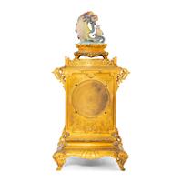 A French "Japonisme" Gilt Bronze and Porcelain Mounted Clock