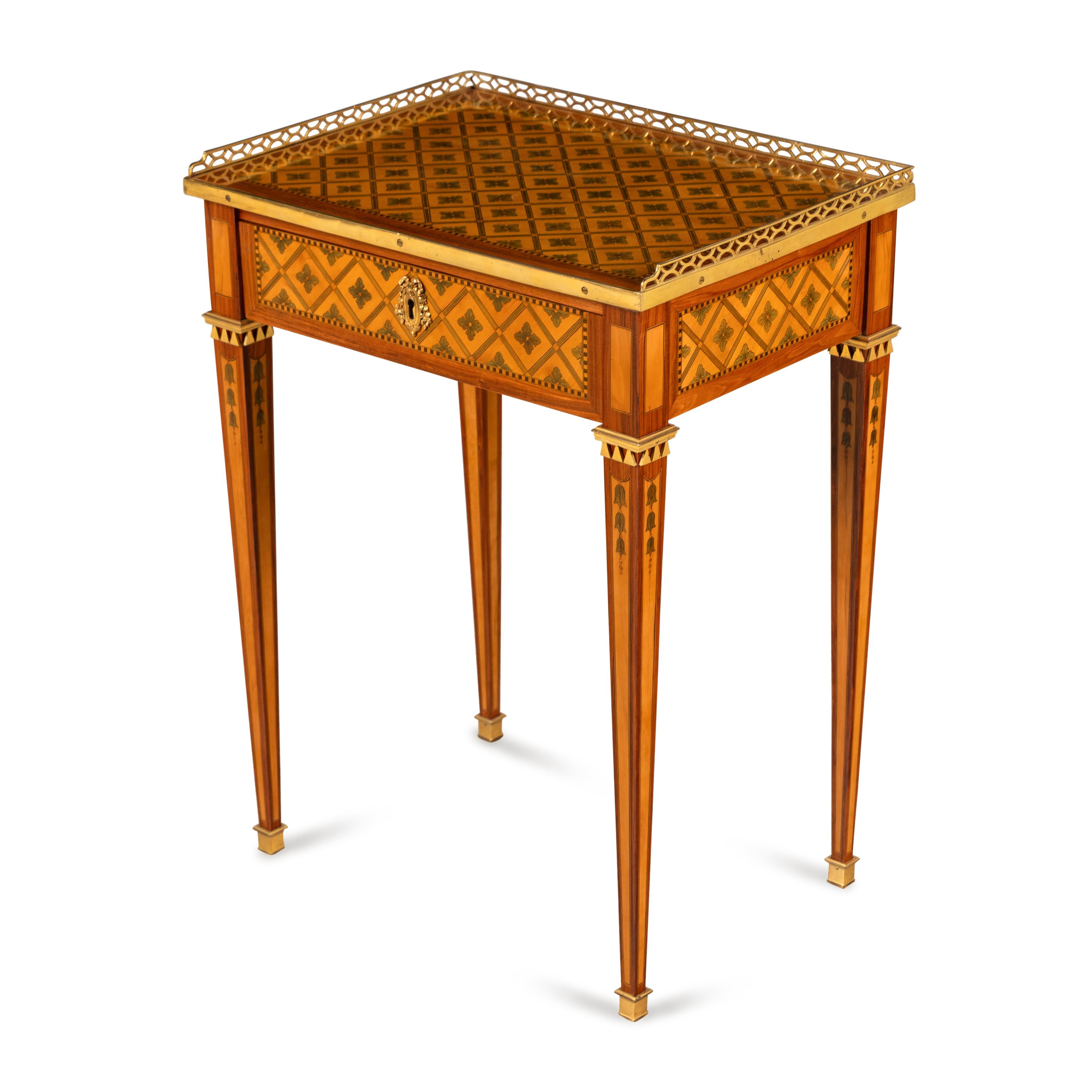 A Louis XVI Ormolu-Mounted Tulipwood, Sycamore and Boxwood Parquetry Table à Écrire