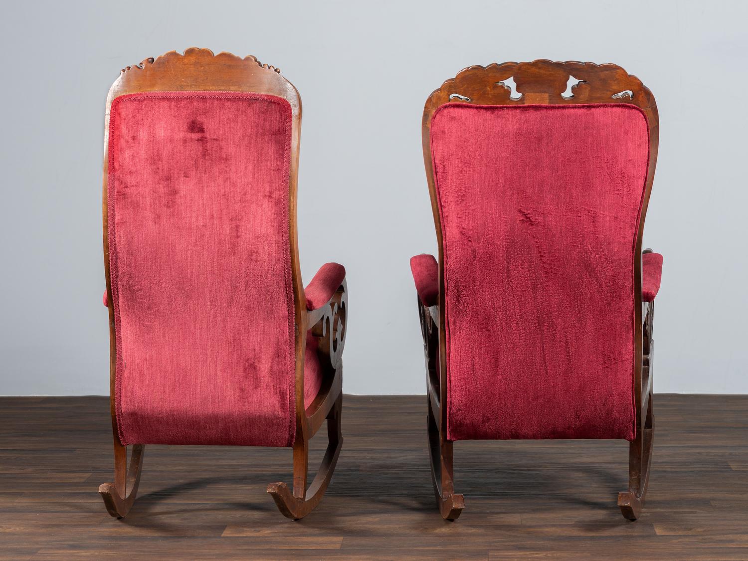 A Matched Pair of Victorian Carved Walnut Rocker Armchairs